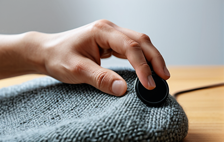 A close-up shot of a person's well-formed hands, gently exploring the diverse textures of various objects in a clean, modern design studio. The hands are touching a warm, smoothly polished wooden surface, a soft, luxurious wool fabric, and a sleek, matte-finished earphone case that resembles fine stone. Soft, natural light illuminates the scene, highlighting the subtle details and tactile qualities of each material. Perfect anatomy, correct proportions, natural pose, proper finger count, fully clothed, modest clothing, appropriate attire, professional photography, high quality, safe for work, appropriate content, family-friendly.